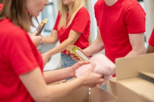 volunteers organizing donations and supplies
